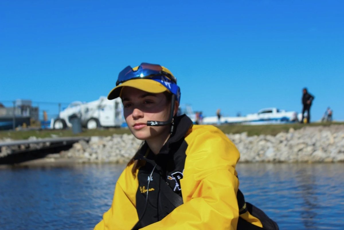 Alexa Plarinos, a senior, begins a count-off on her boat. She placed second in the race she competed in.